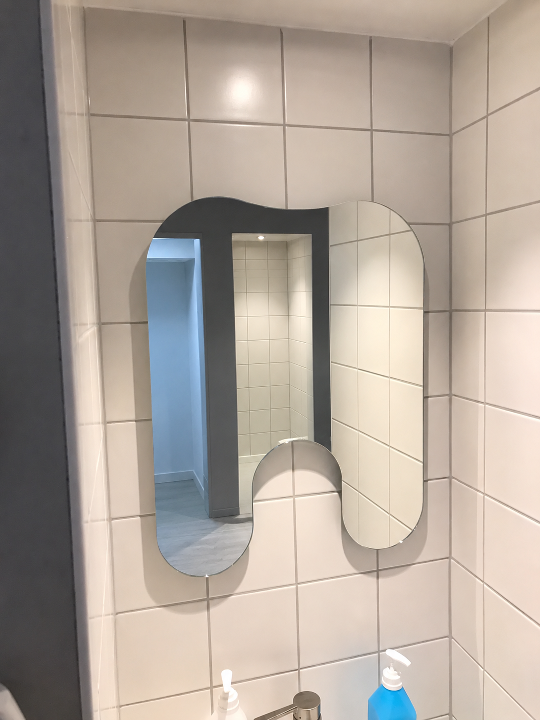 Tandformad spegel